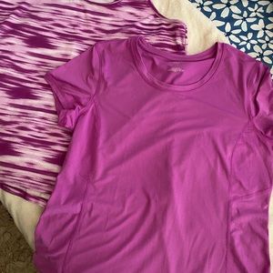 Lot of like new Danskin and Tek Gear workout tops, both Xl.